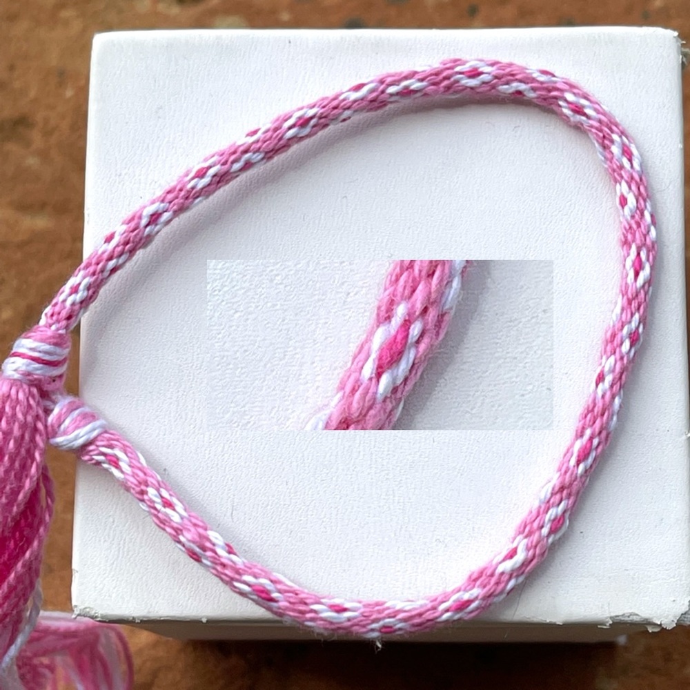 Handmade pink/white floss friendship bracelet